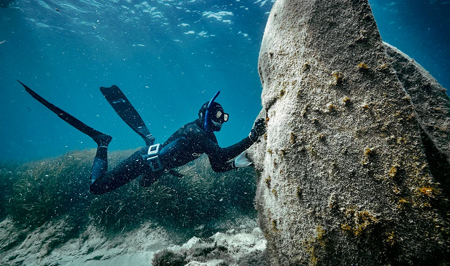 Diver in underwater eco-museum in Cannes